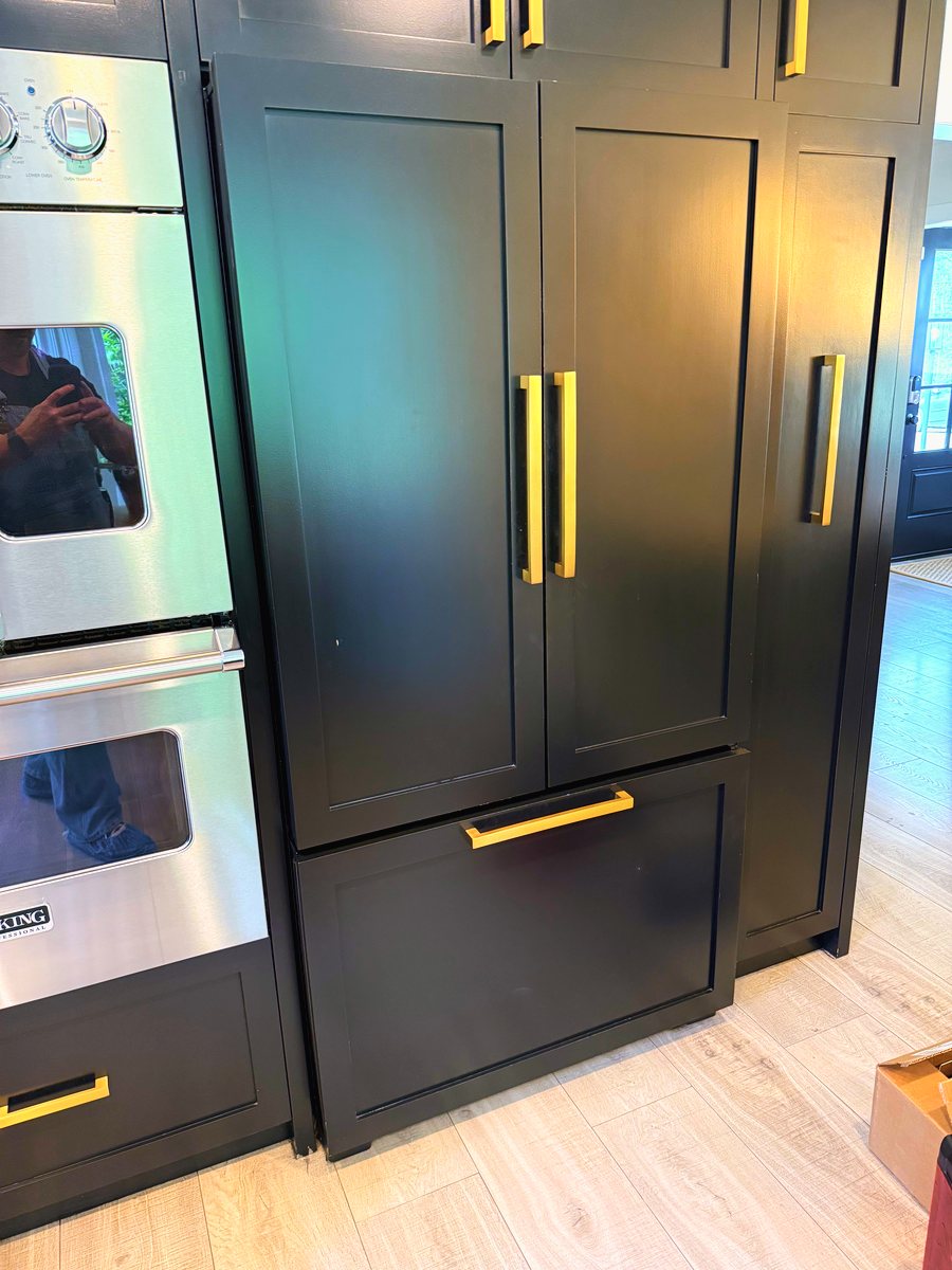 Panel-ready built-in French door refrigerator in a modern home kitchen — Appliance Rescue Team serves Oradell, NJ