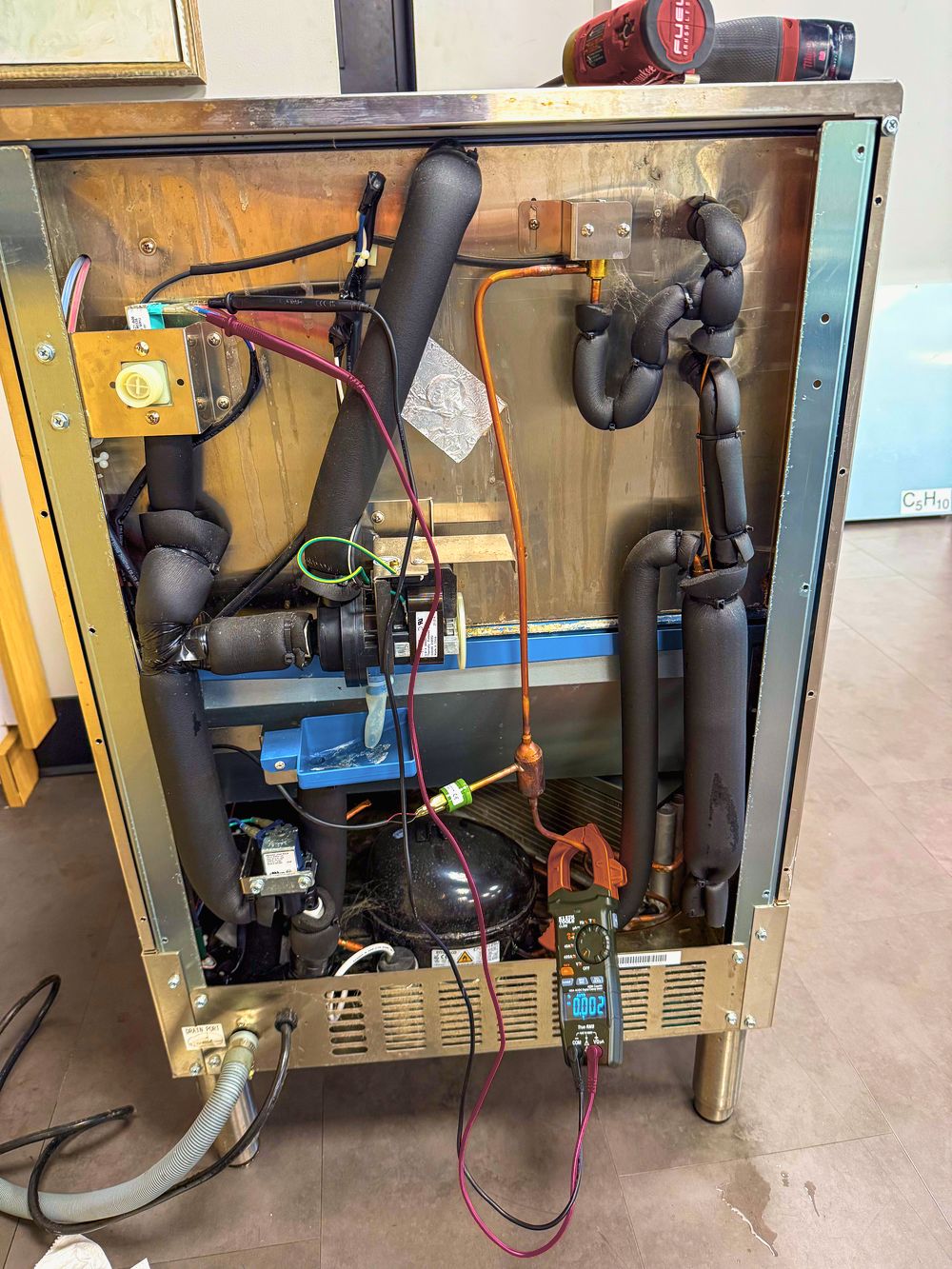 Appliance Rescue Team technician repairing a refrigerator ice maker in Bergen County, NJ