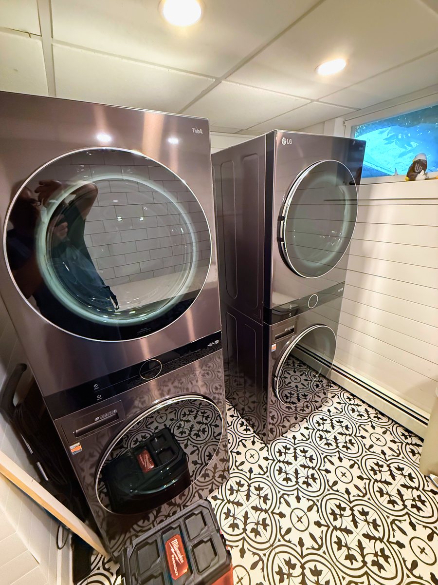 LG WashTower stacked washer and dryer in a home laundry room — Appliance Rescue Team serves Alpine, NJ