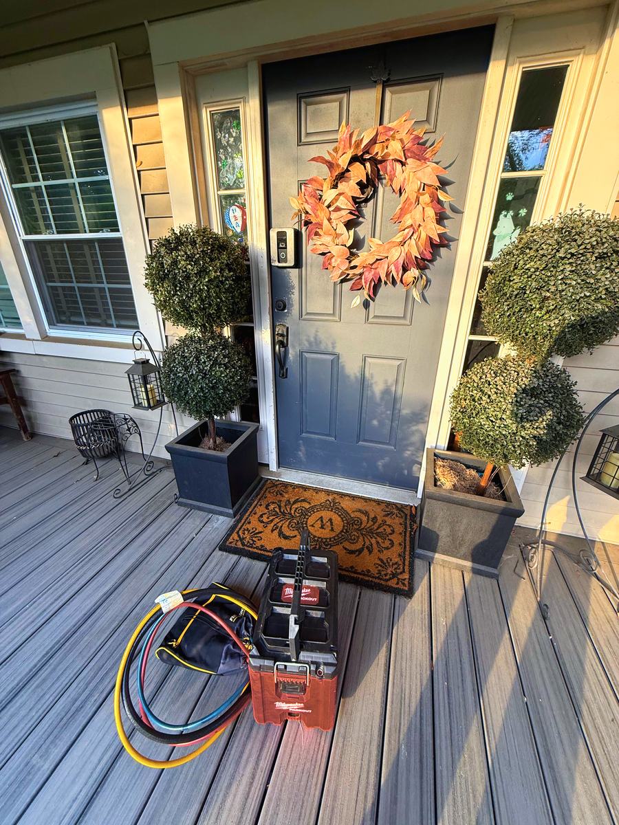 Appliance Rescue Team tool case at the front door of a home on a service call — Appliance Rescue Team serves Bergenfield, NJ