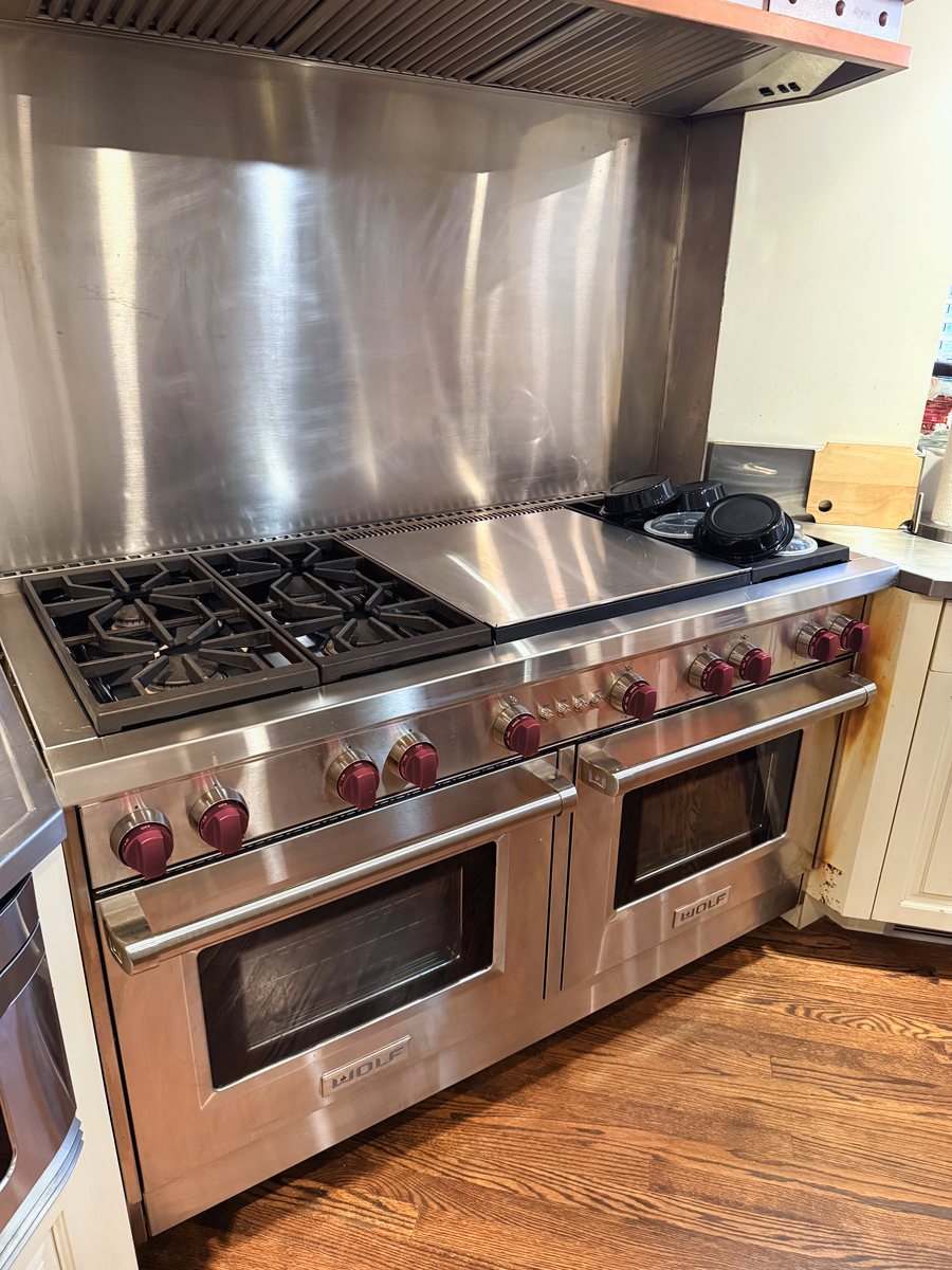 Wolf professional gas range with double ovens in a home kitchen — Appliance Rescue Team serves Demarest, NJ