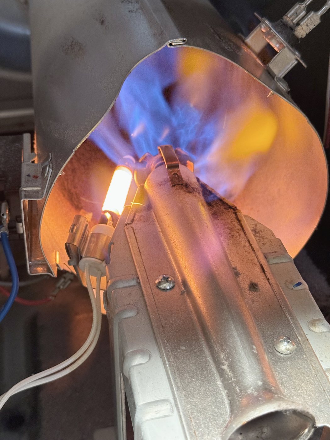 After the new igniter: it glows white, the gas valve opens, and the burner lights clean and blue