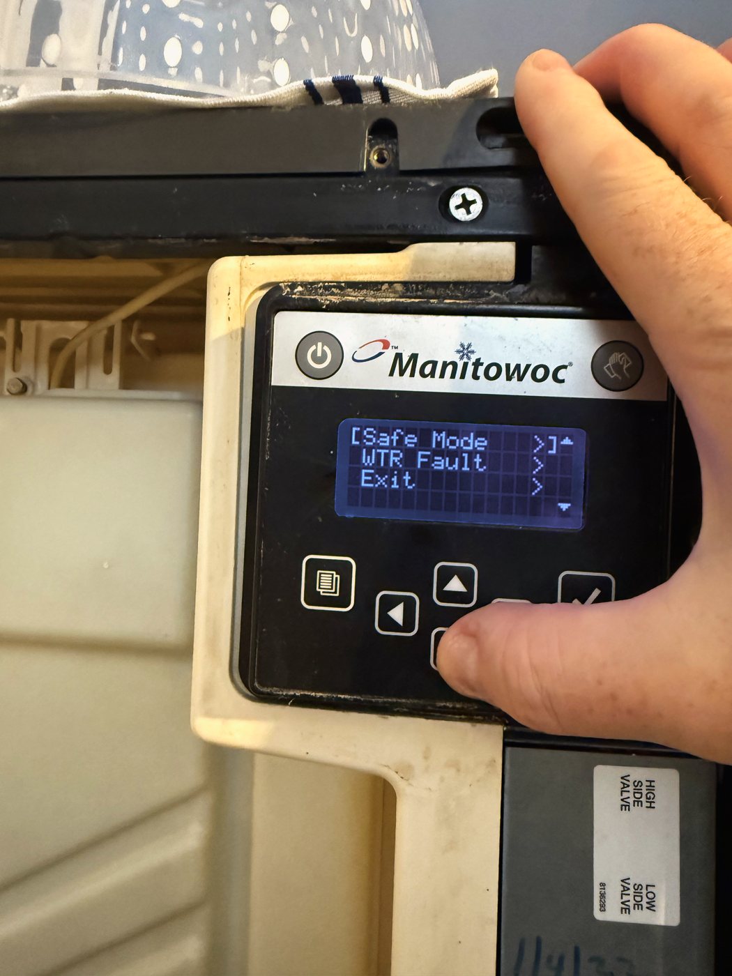 What the machine had been saying all along: Safe Mode, WTR Fault. It kept making ice, so nobody read it